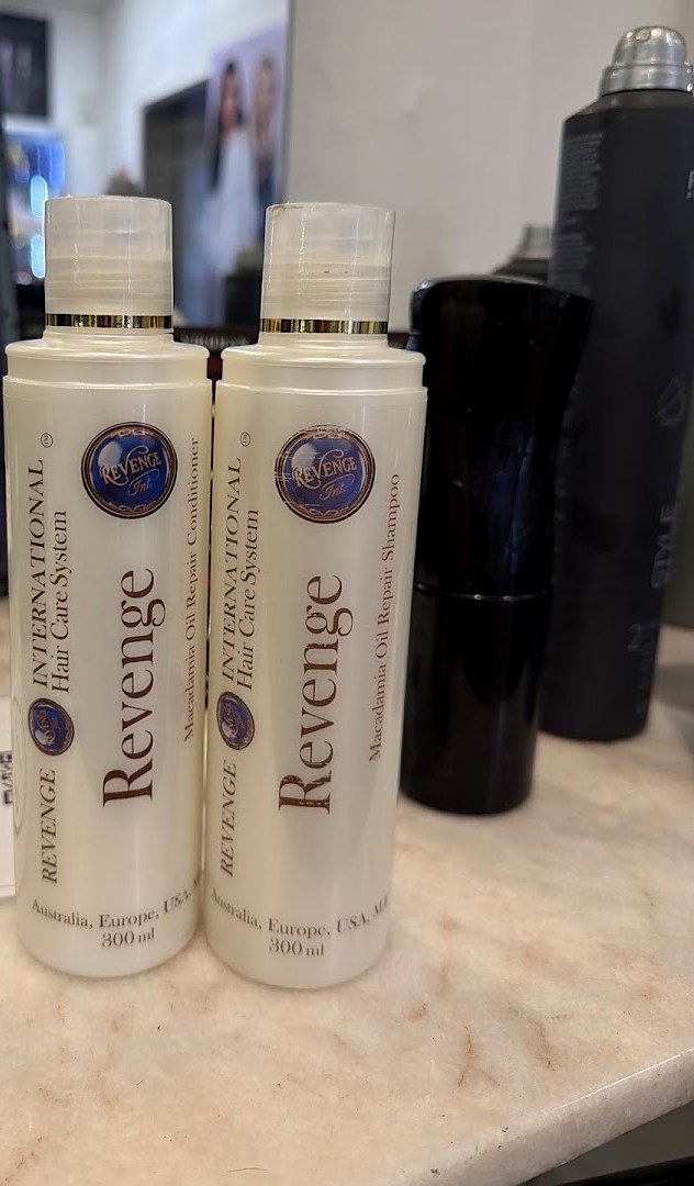 Revenge International shampoo and conditioner on the salon counter